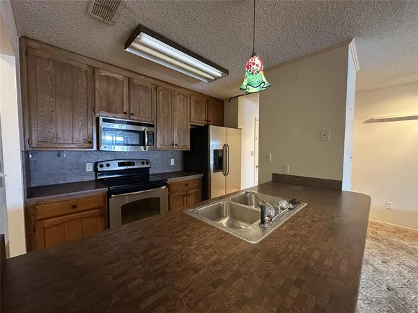 $395,000 | 2002 Mockingbird Bend, Unit B5, Graford, TX 76449