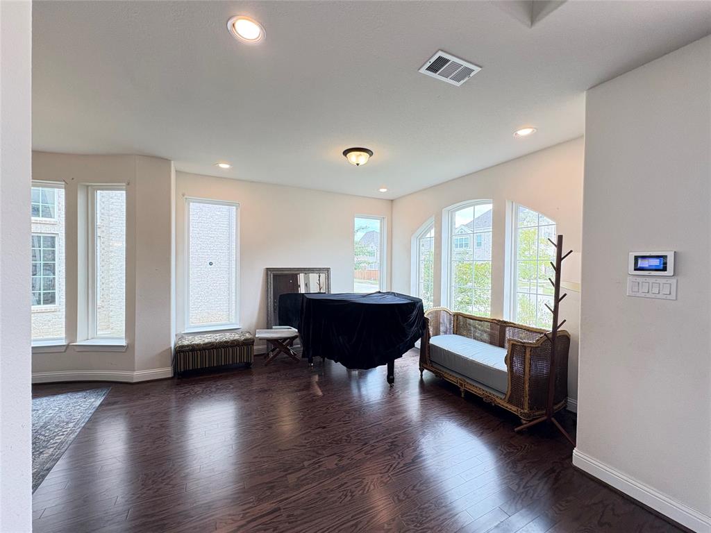323 Butternut Way Irving, TX 75063 - Photo 5 of 32 a living room with furniture and a large window