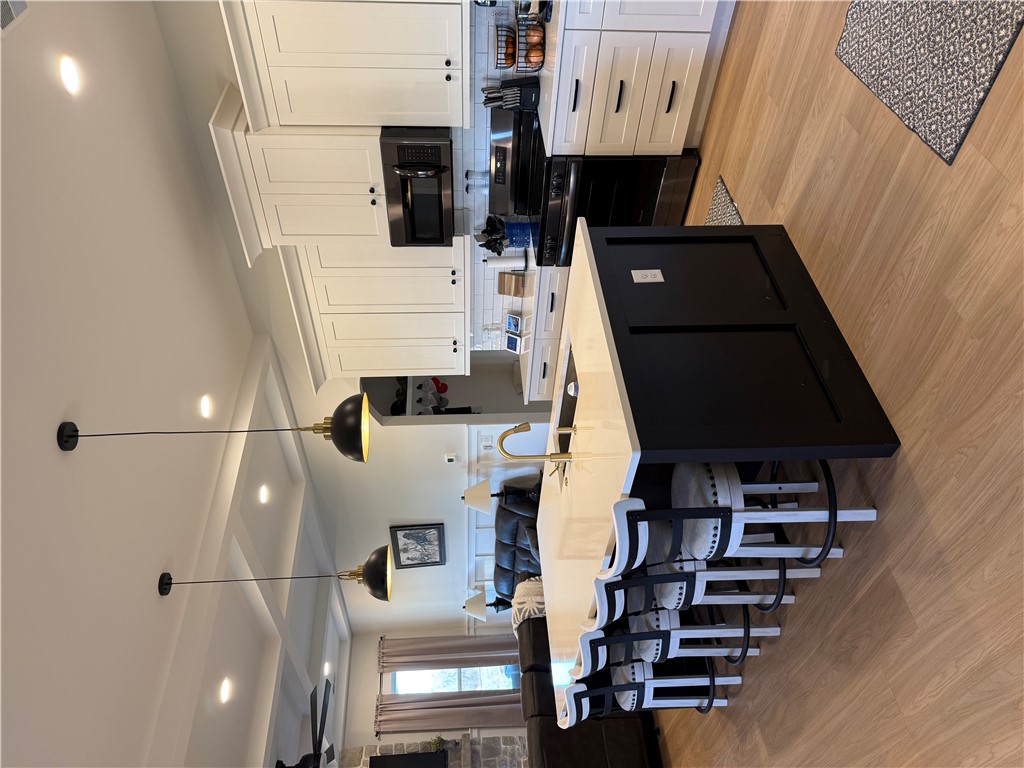 119 Dobbins Road Townville, SC 29689 - Photo 16 of 25 This kitchen blends style and function with modern appliances and ample counter space.