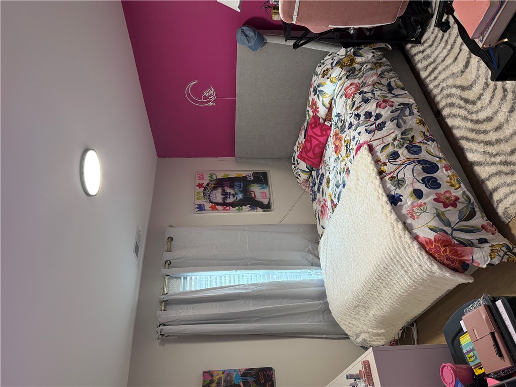 119 Dobbins Road Townville, SC 29689 - Photo 19 of 25 This cozy bedroom provides a comfortable and inviting atmosphere for peaceful rest.