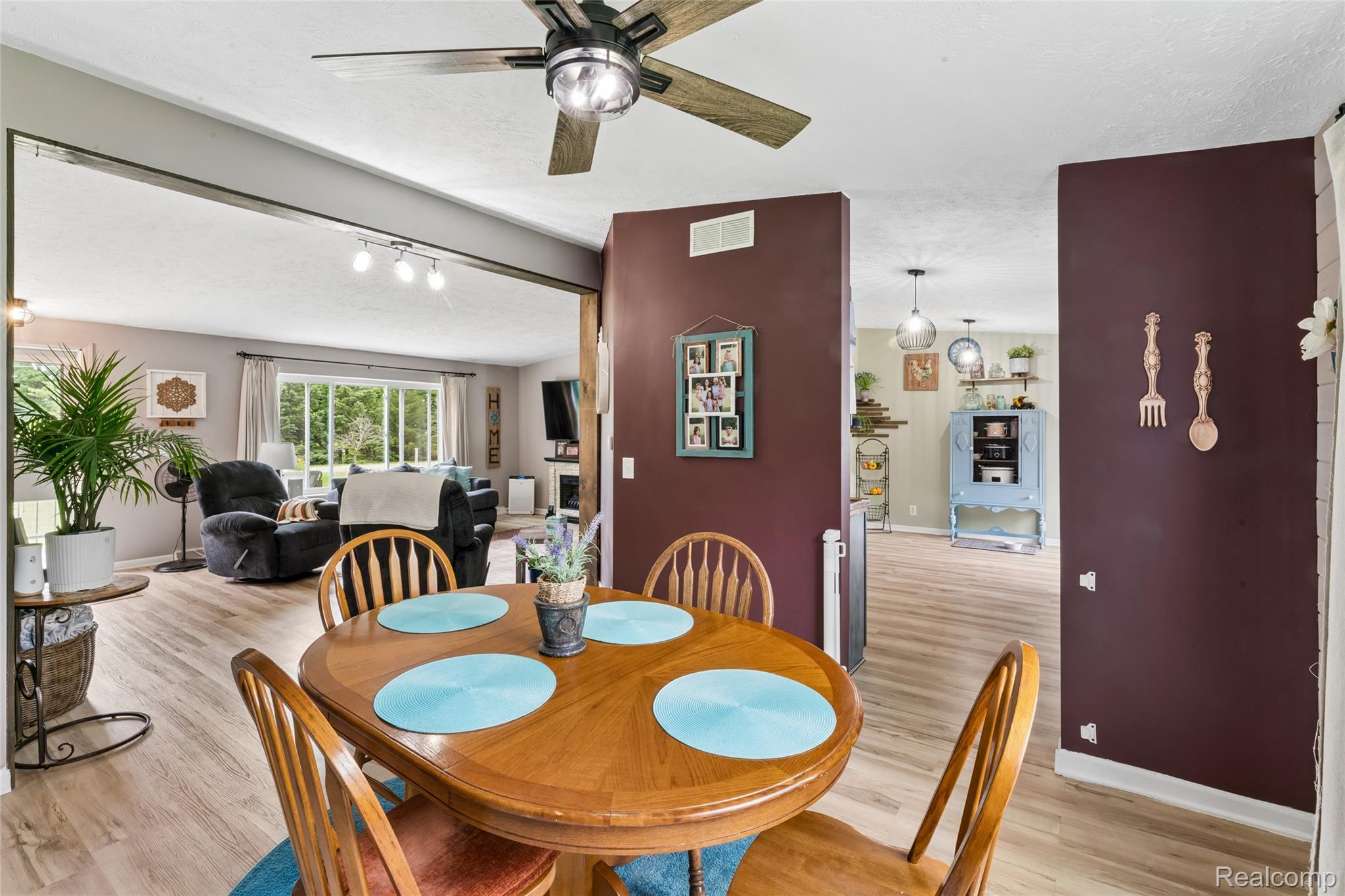 1336 West Hurd Road Clio, MI 48420 - Photo 21 of 43 Dining area featuring a wood-finish table and chairs under a ceiling fan