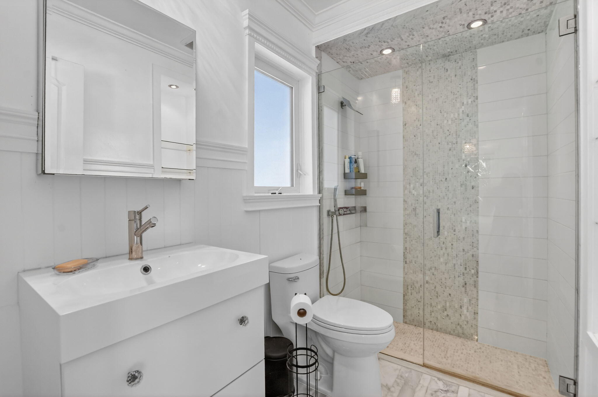 1455 Isabel Road East Boca Raton, FL 33486 - Photo 14 of 33 a bathroom with a sink a toilet and shower