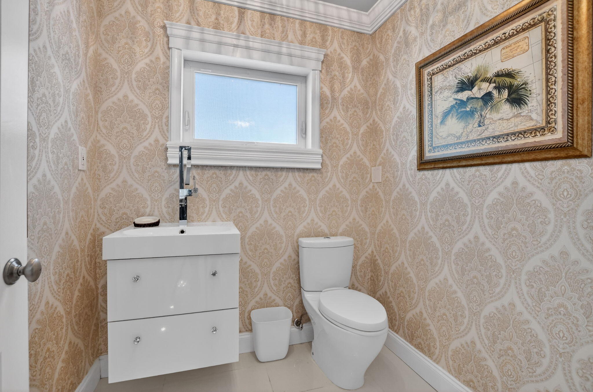 1455 Isabel Road East Boca Raton, FL 33486 - Photo 15 of 33 a white toilet sitting next to a bathroom sink