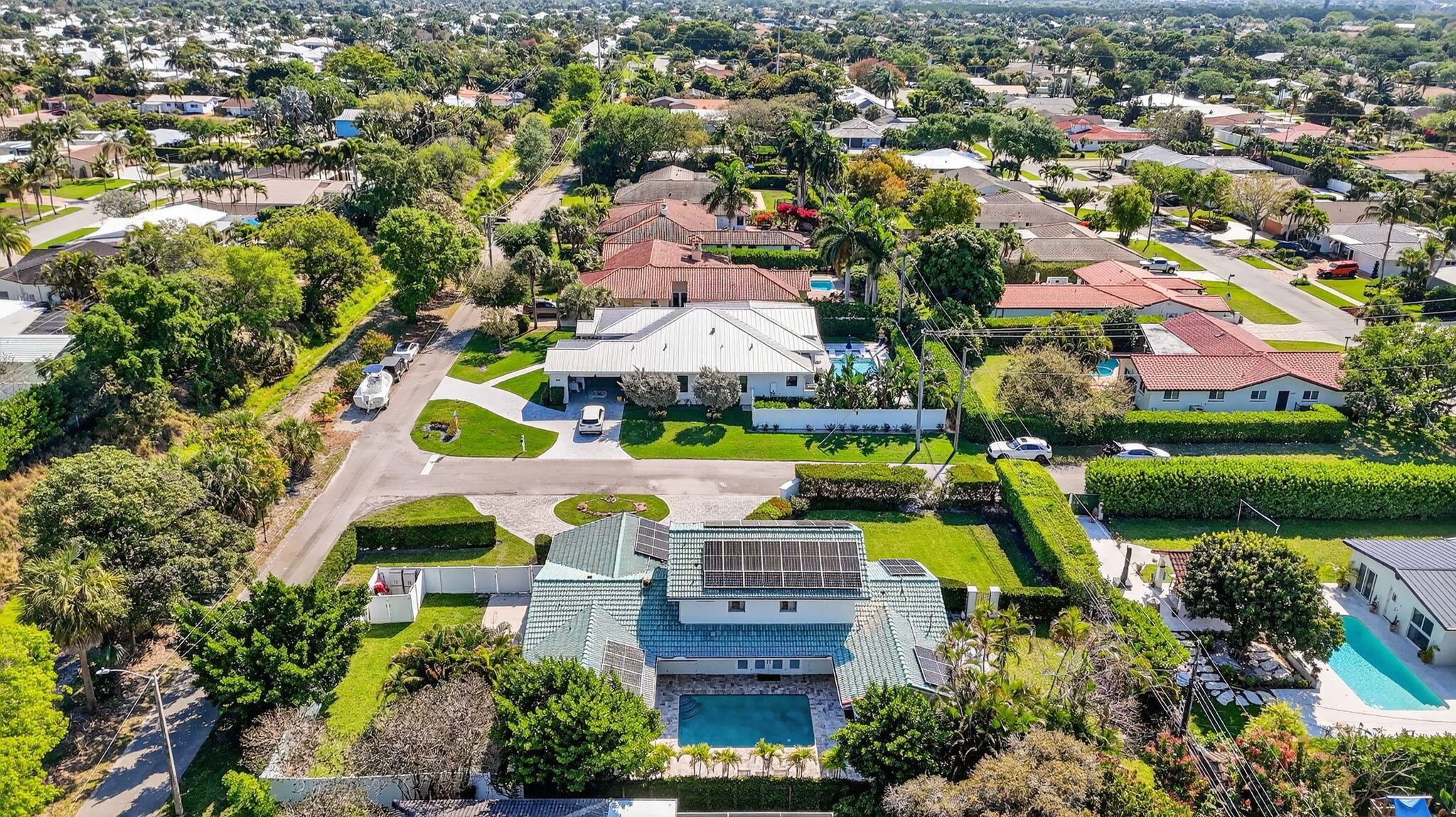 1455 Isabel Road East Boca Raton, FL 33486 - Photo 33 of 33 an aerial view of residential building with outdoor space and swimming pool