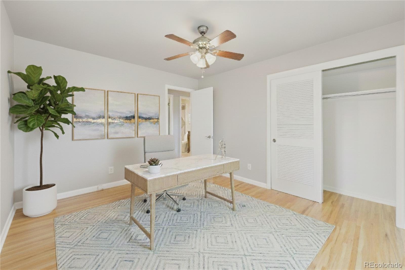 6085 Simms Street Arvada, CO 80004 - Photo 11 of 32 a workspace with furniture and window