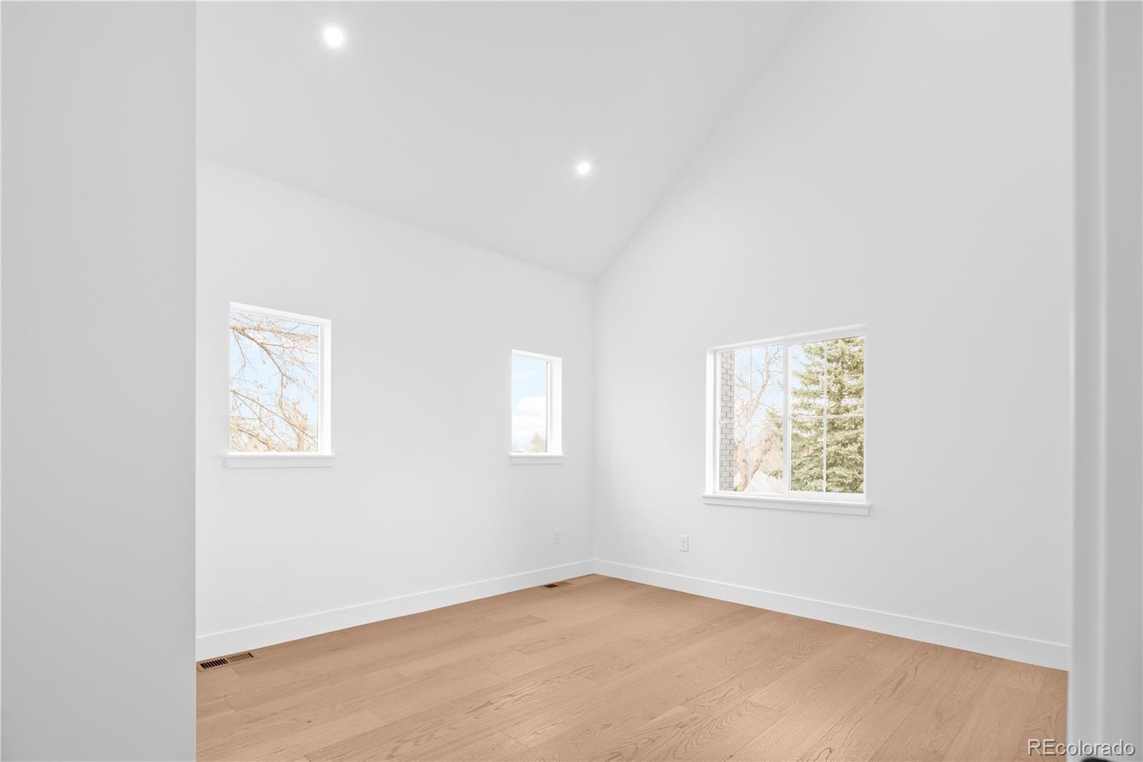 3283 Ames Street Wheat Ridge, CO 80212 - Photo 32 of 41 an empty room with windows