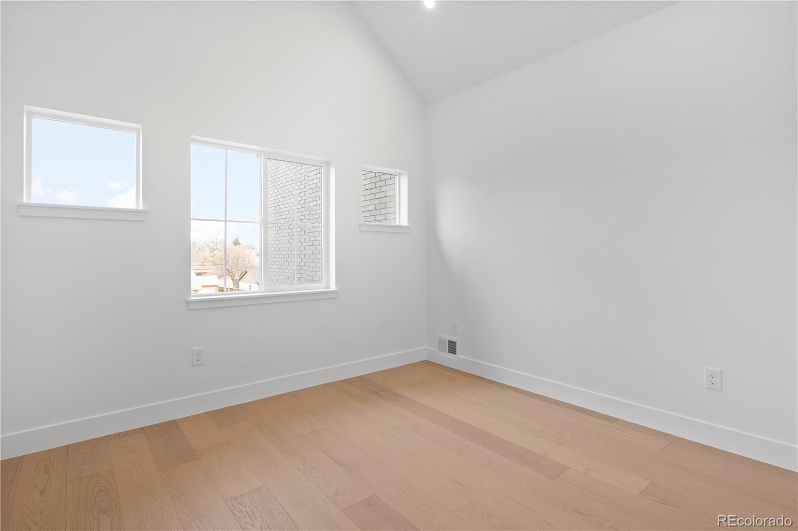 3283 Ames Street Wheat Ridge, CO 80212 - Photo 33 of 41 an empty room with a window