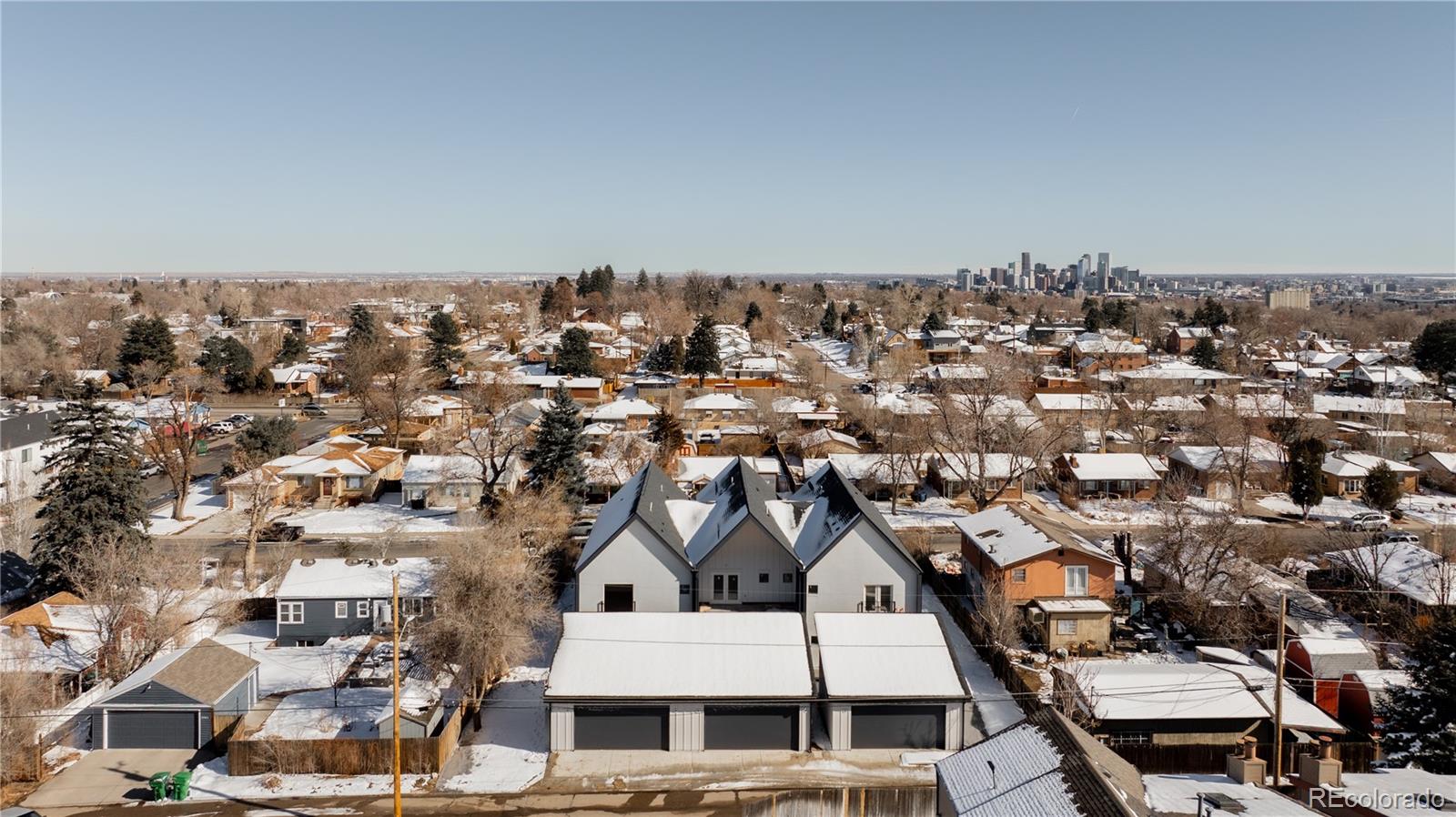3283 Ames Street Wheat Ridge, CO 80212 - Photo 40 of 41 an aerial view of a house with a city view