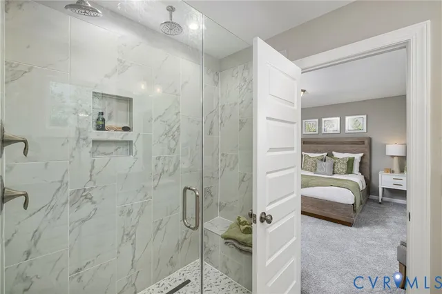 a en suite bathroom with a sink and a shower