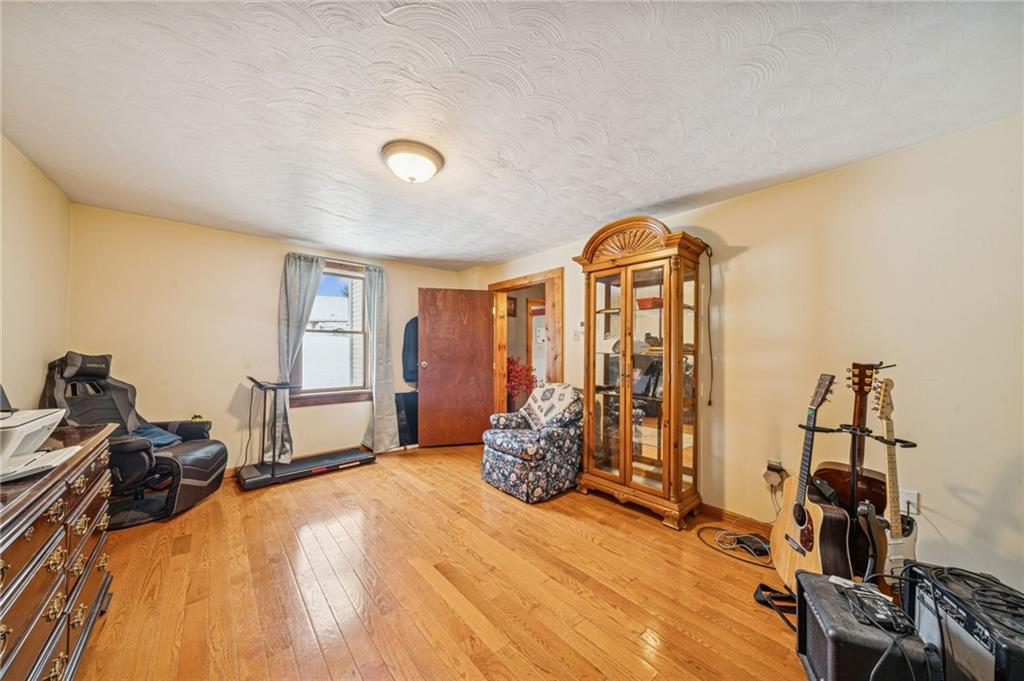 144 Double Hill Road Mount Pleasant, PA 15666 - Photo 13 of 41 a bedroom with a bed and a table