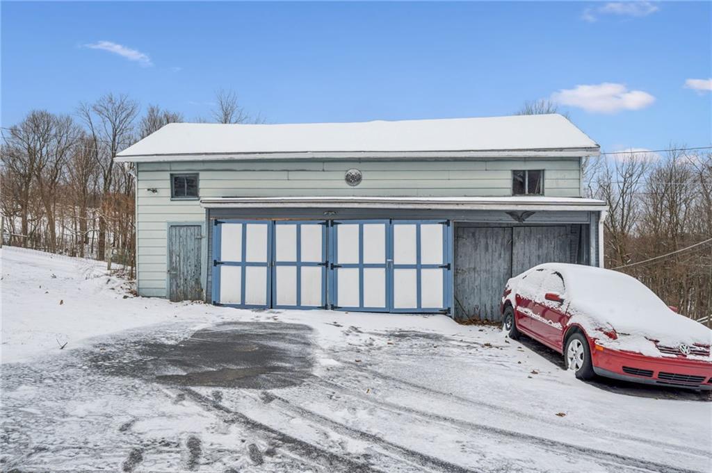 144 Double Hill Road Mount Pleasant, PA 15666 - Photo 33 of 41 a view of a car park in front of house