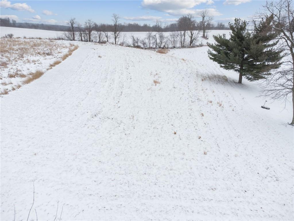 144 Double Hill Road Mount Pleasant, PA 15666 - Photo 34 of 41 a view of a dry yard covered with snow