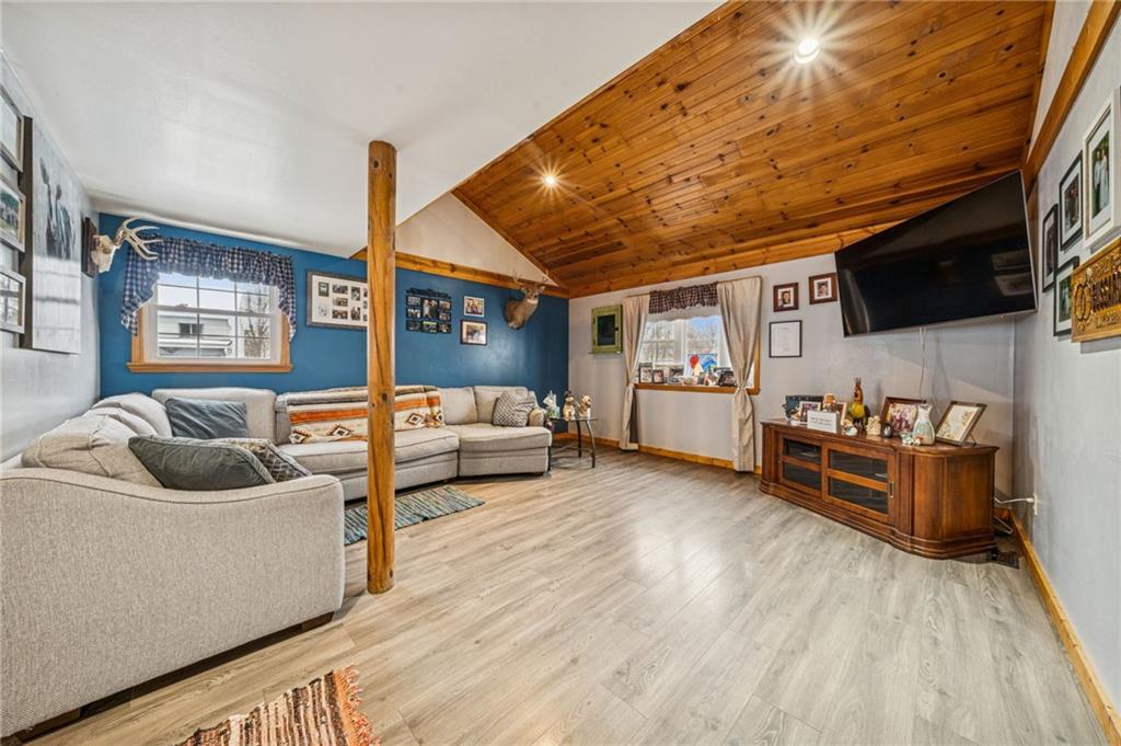 144 Double Hill Road Mount Pleasant, PA 15666 - Photo 6 of 41 a living room with furniture and a flat screen tv