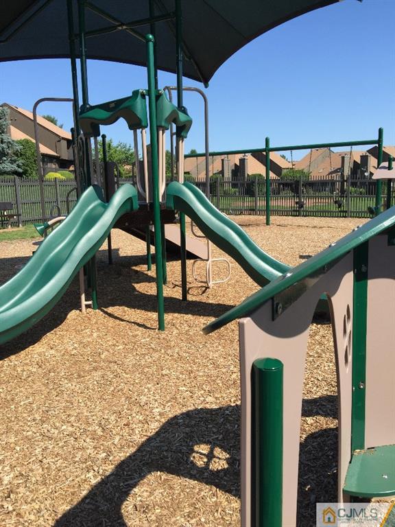 136 Westgate Drive Edison, NJ 08820 - Photo 17 of 19 a view of swimming pool with a patio