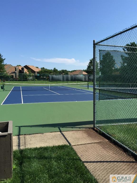 136 Westgate Drive Edison, NJ 08820 - Photo 19 of 19 a view of an outdoor space and tennis court
