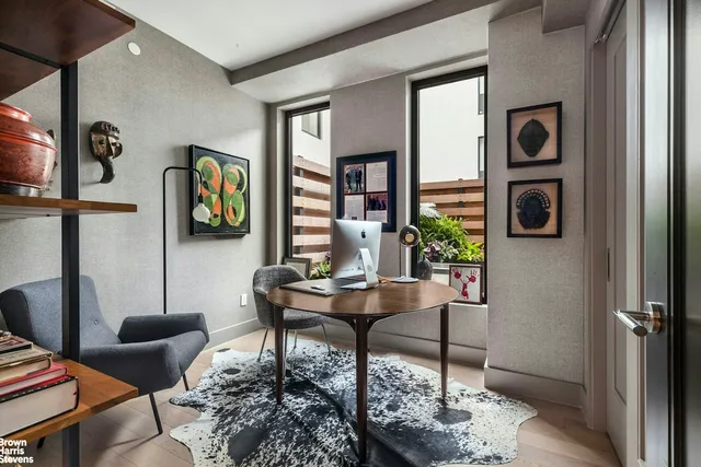 a living room with furniture and a window