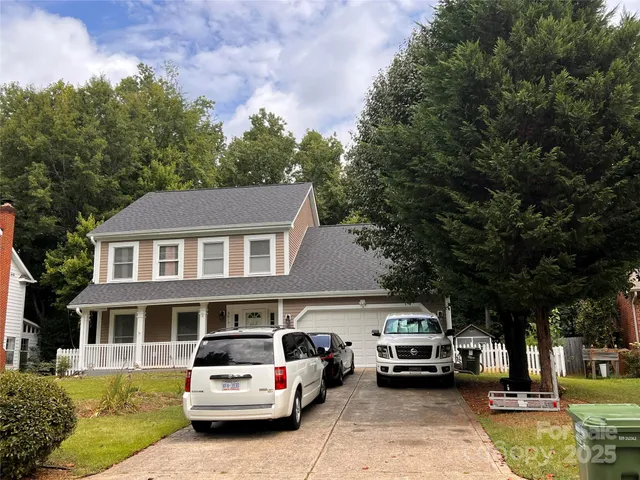 a car parked in front of a house