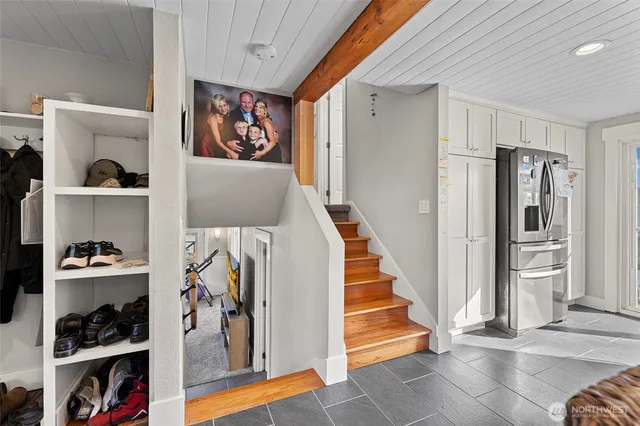 a view of a livingroom with closet and bedroom