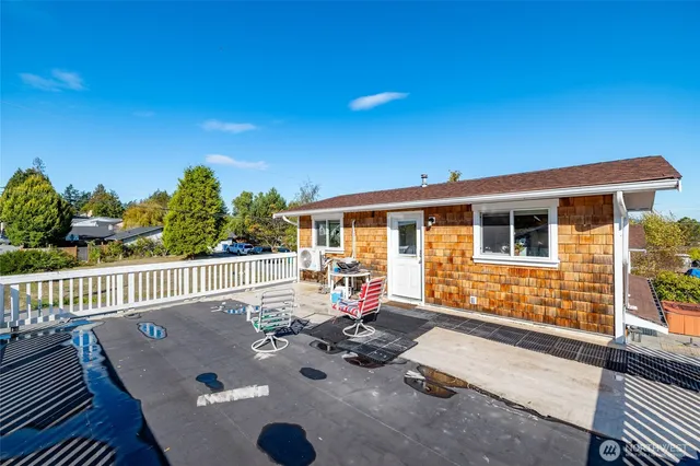 a view of house with a patio