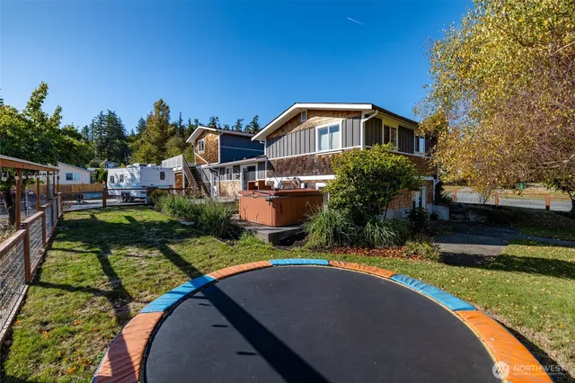 a view of a house with a swimming pool