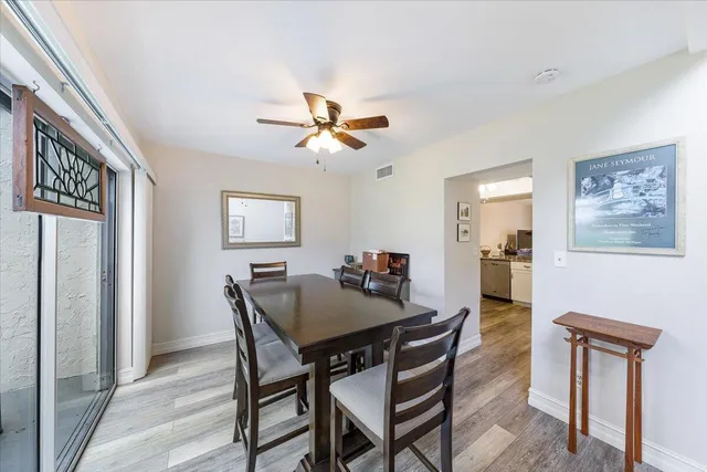 a view of a dining room with furniture