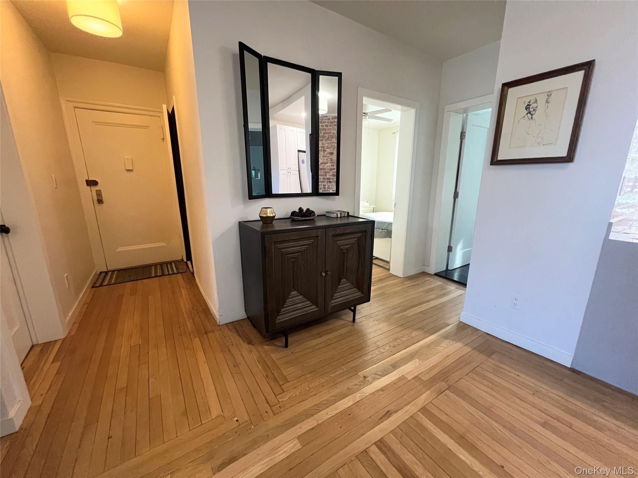 64 Sagamore Road, Unit E6 Bronxville, NY 10708 - Photo 3 of 18 a view of a room with wooden floor