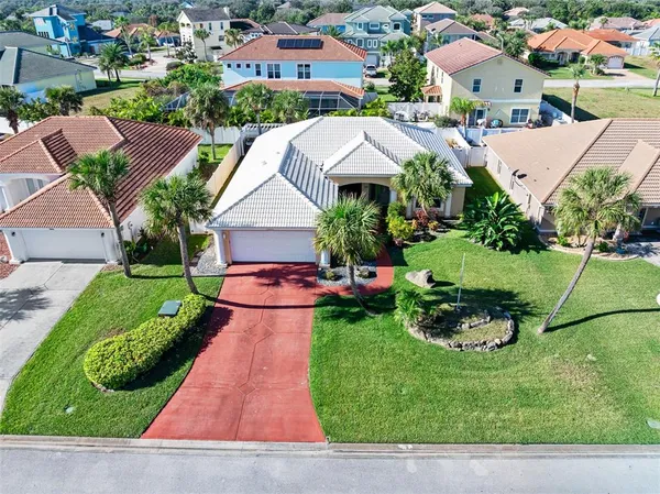 a aerial view of a house with garden