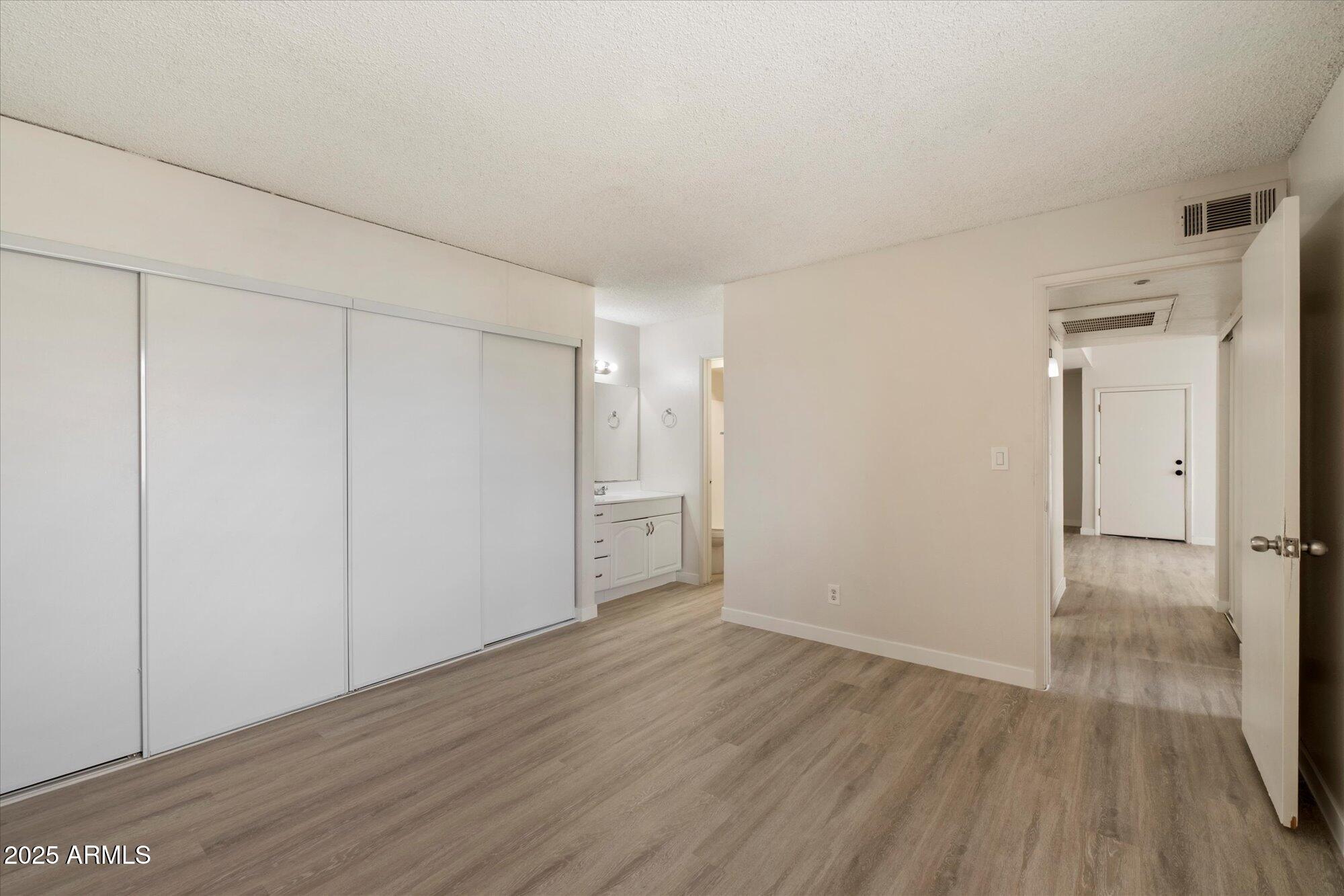 8055 East Thomas Road, Unit A202 Scottsdale, AZ 85251 - Photo 13 of 30 a view of an empty room