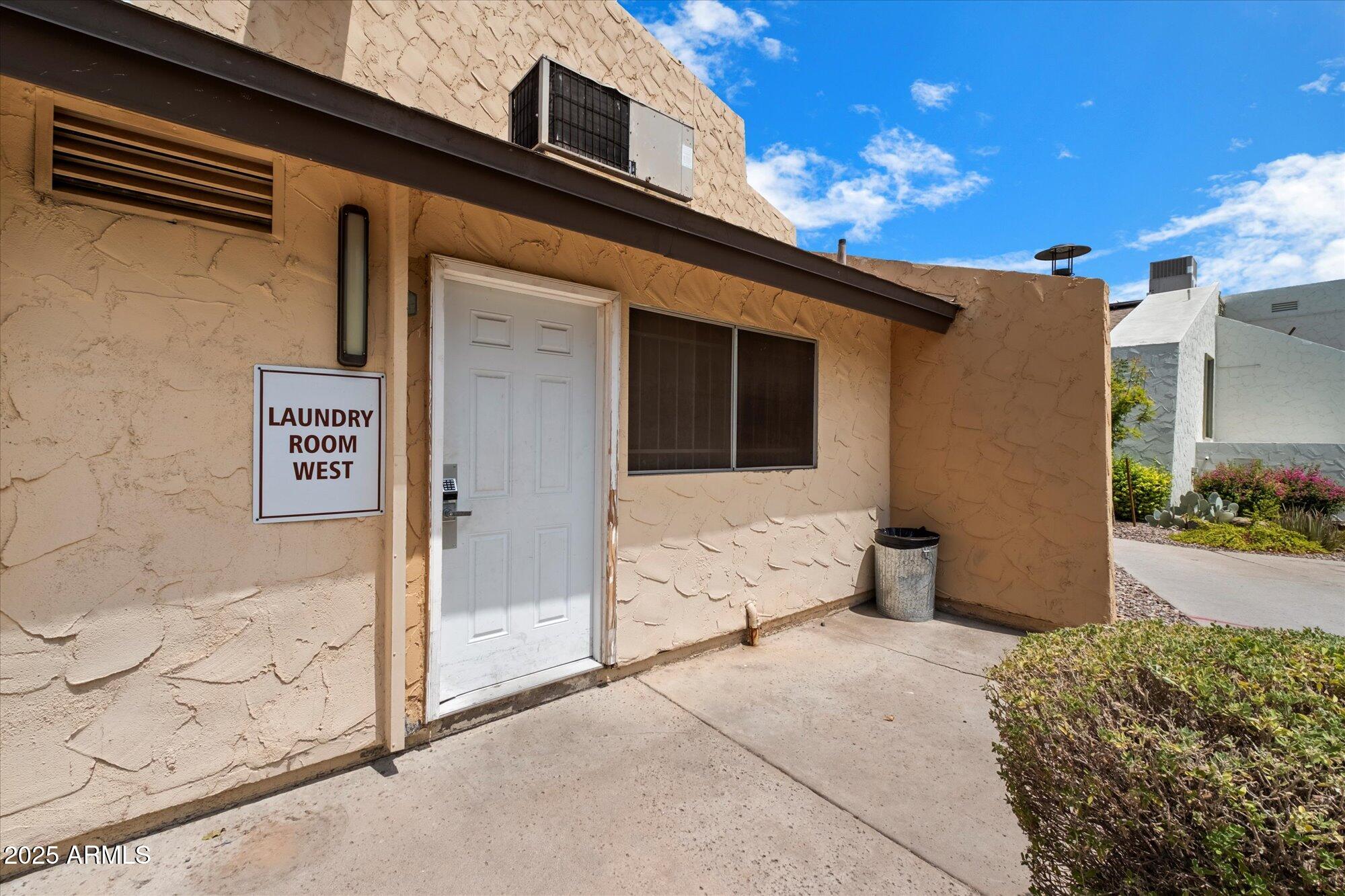 8055 East Thomas Road, Unit A202 Scottsdale, AZ 85251 - Photo 23 of 30 a front view of a house