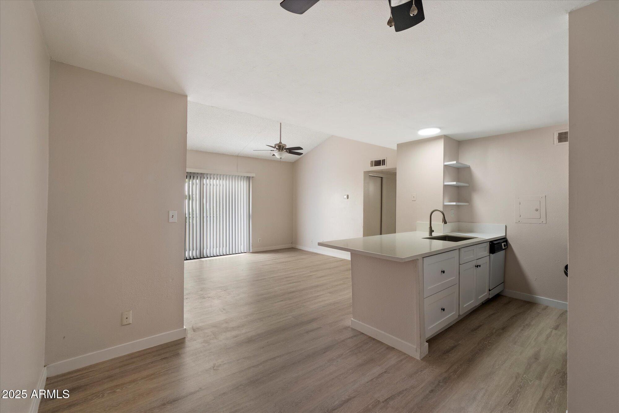 8055 East Thomas Road, Unit A202 Scottsdale, AZ 85251 - Photo 8 of 30 a bathroom with a double vanity sink and mirror