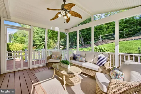 a outdoor space with patio the couches and a dining table with garden view