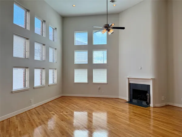 a kitchen with stainless steel appliances kitchen island a stove a sink and a refrigerator
