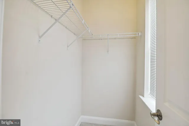 a view of a room with racks on the wall