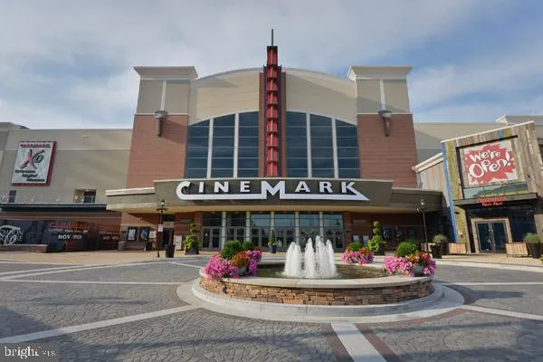 a store with outdoor seating area and retail shop