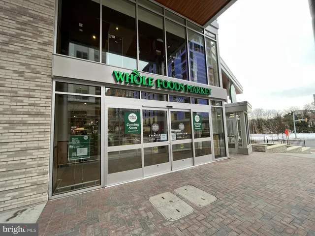 a view of a brick house with a large window