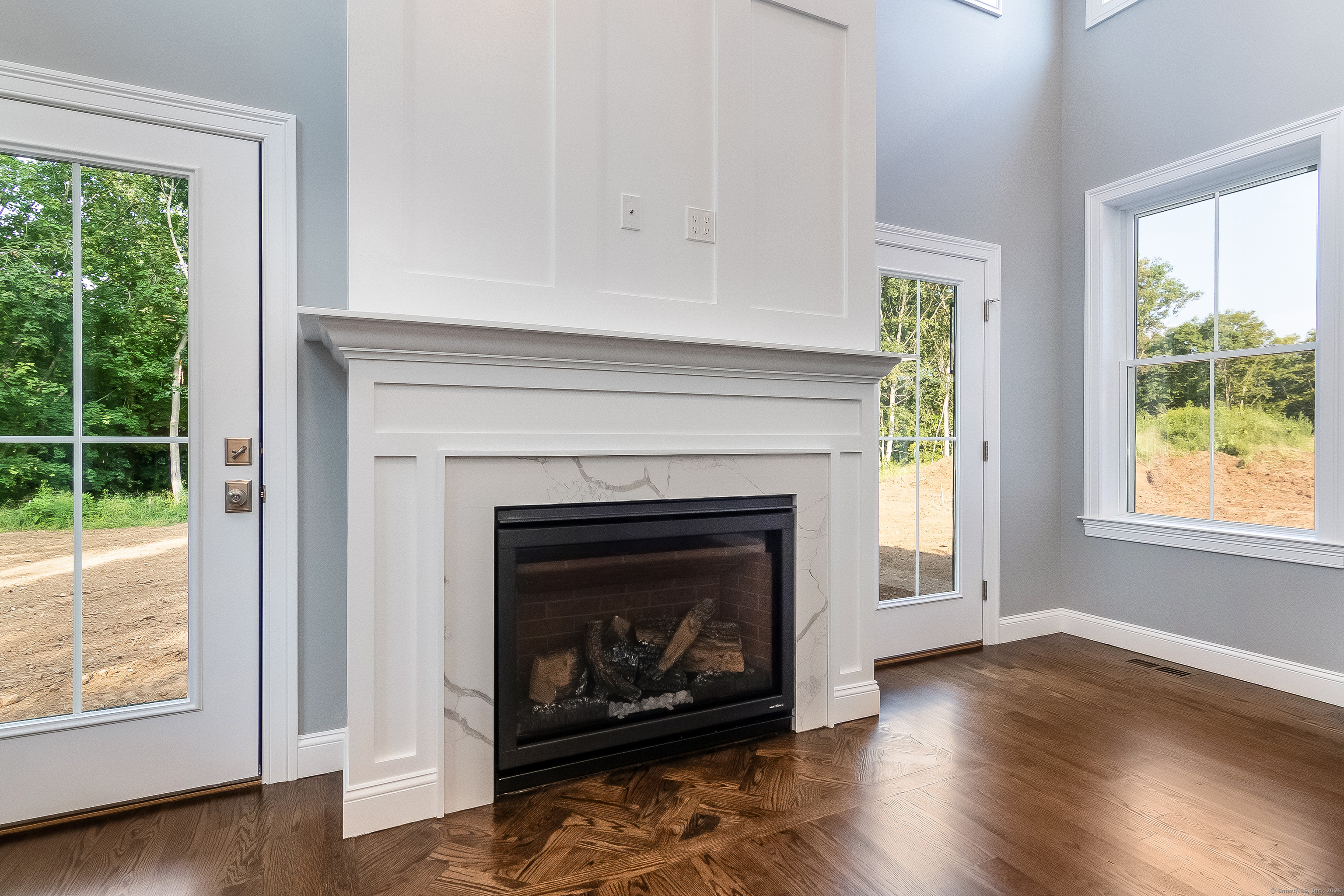 11 Buttonball Road Old Lyme, CT 06371 - Photo 20 of 37 Example of a fireplace, check out the inlaid wood hearth.