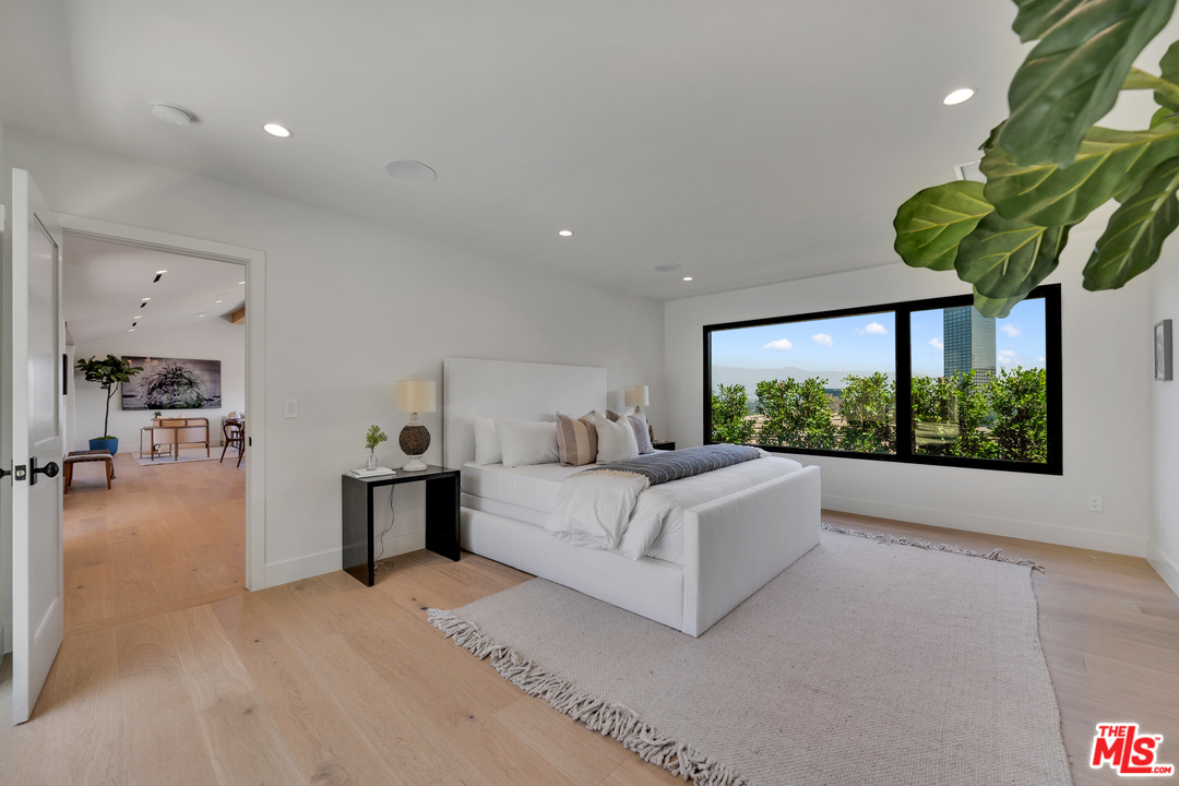 3614 Willowcrest Avenue Studio City, CA 91604 - Photo 22 of 43 a living room with furniture and a large window