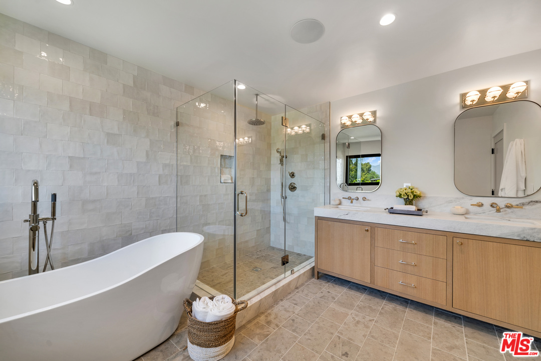 3614 Willowcrest Avenue Studio City, CA 91604 - Photo 27 of 43 a bathroom with a double vanity sink mirror and bathtub