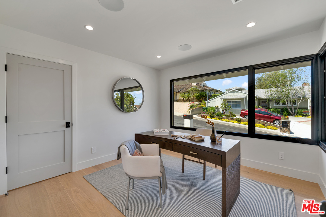 3614 Willowcrest Avenue Studio City, CA 91604 - Photo 33 of 43 a living room with furniture and a large window