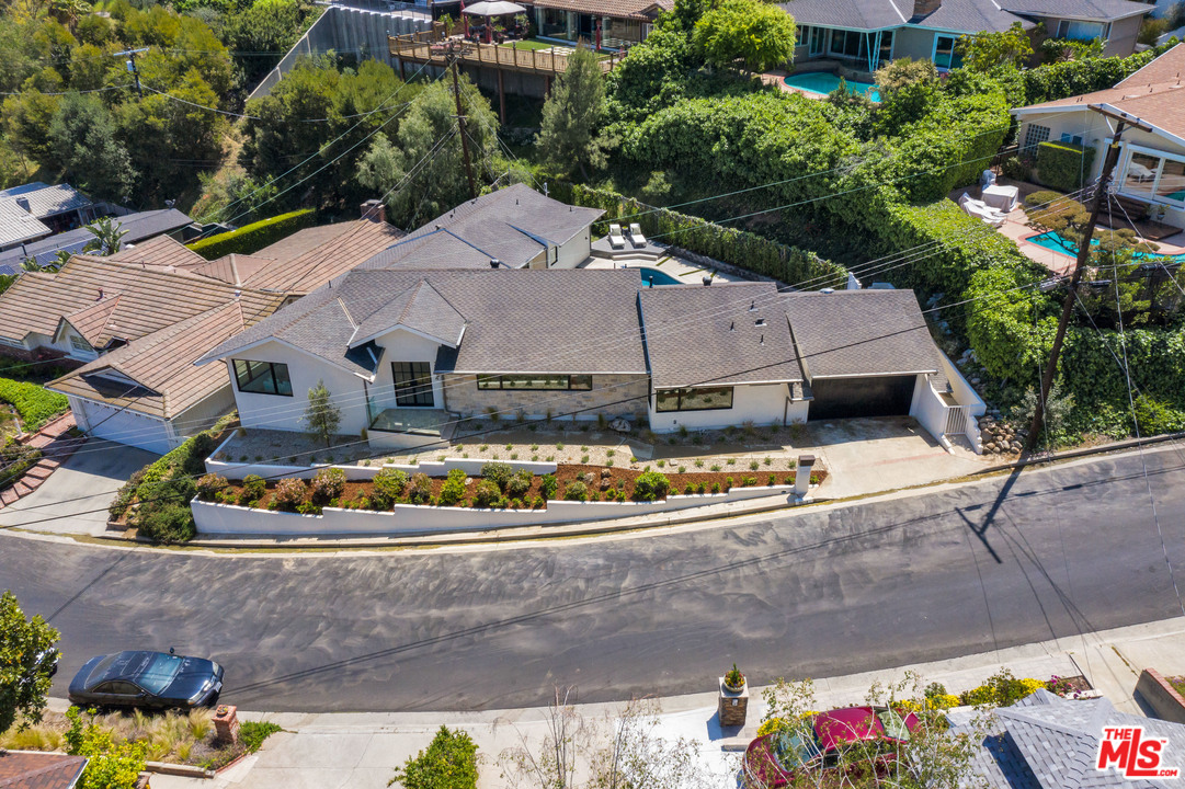 3614 Willowcrest Avenue Studio City, CA 91604 - Photo 38 of 43 an aerial view of a house with a garden and large trees