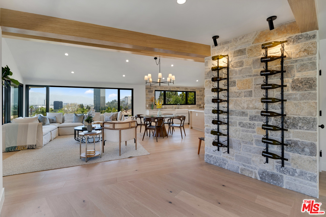 3614 Willowcrest Avenue Studio City, CA 91604 - Photo 8 of 43 a view of a livingroom with furniture and chandelier