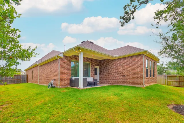 a view of a house with a garden