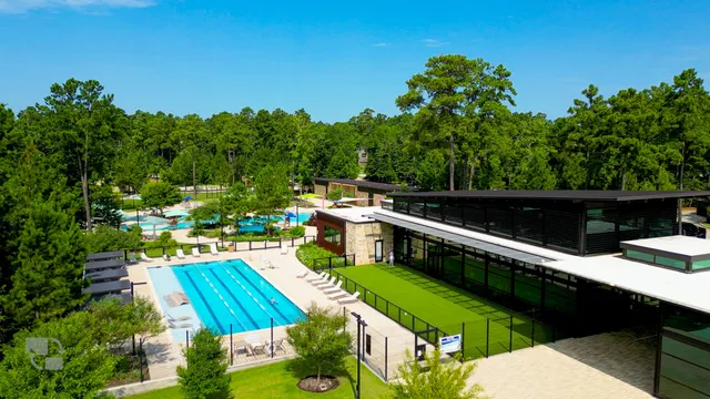 a view of a swimming pool with a garden
