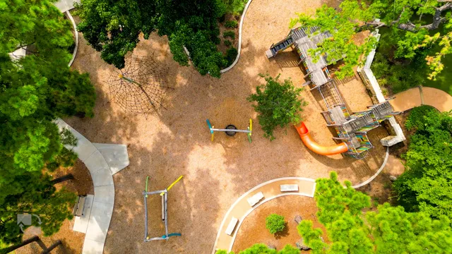 a view of a yard with a tree