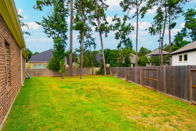 a view of swimming pool with a patio