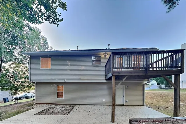 a view of a house with a deck