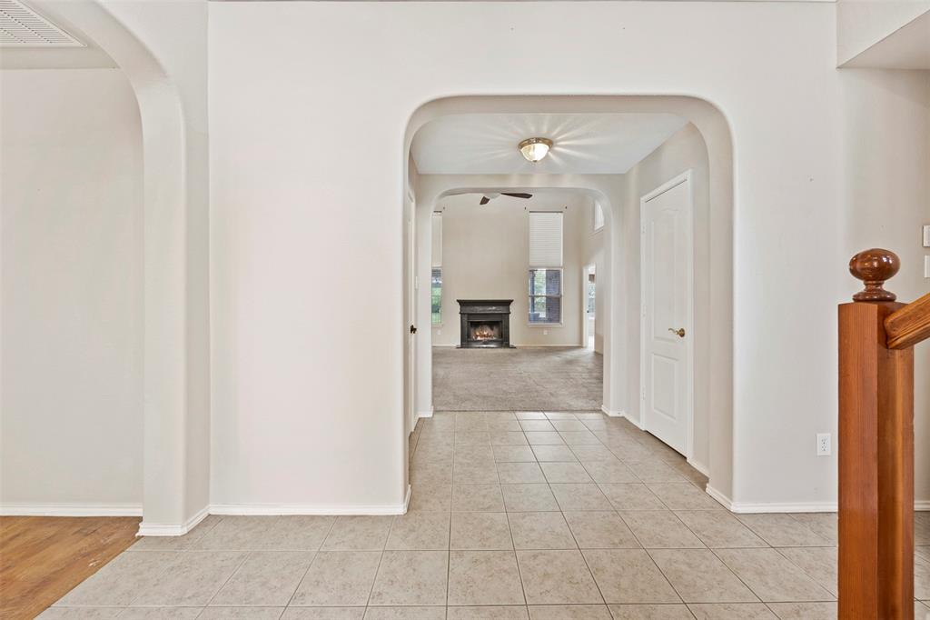 3931 Alpha Way Midlothian, TX 76065 - Photo 7 of 33 a view of a hallway with a living room