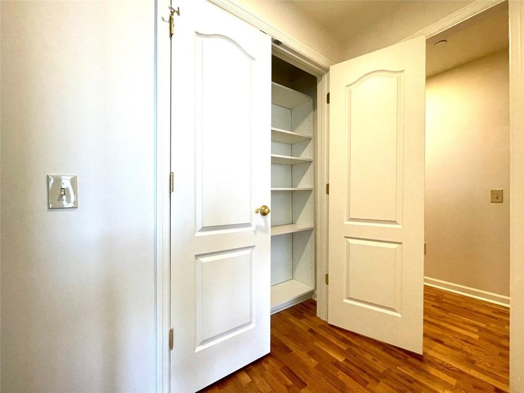 195 14th Street Northeast, Unit P603 Atlanta, GA 30309 - Photo 23 of 27 a view of walk in closet with empty racks