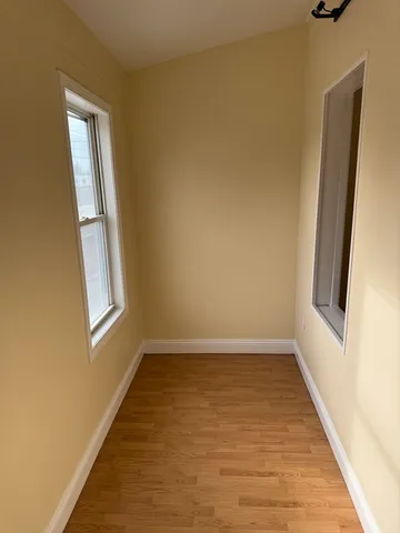 a view of an empty room and window