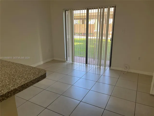 a view of a utility room and window